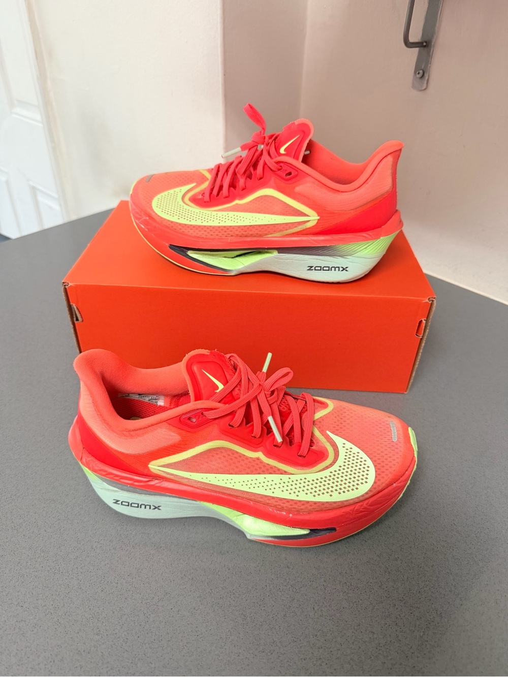 Nike women’s Running Sneakers in Bright Red with Neon Yellow Accents size 8